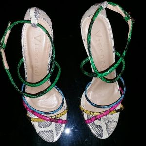 OUT OF STOCK.Vicenza Python print heels Leather